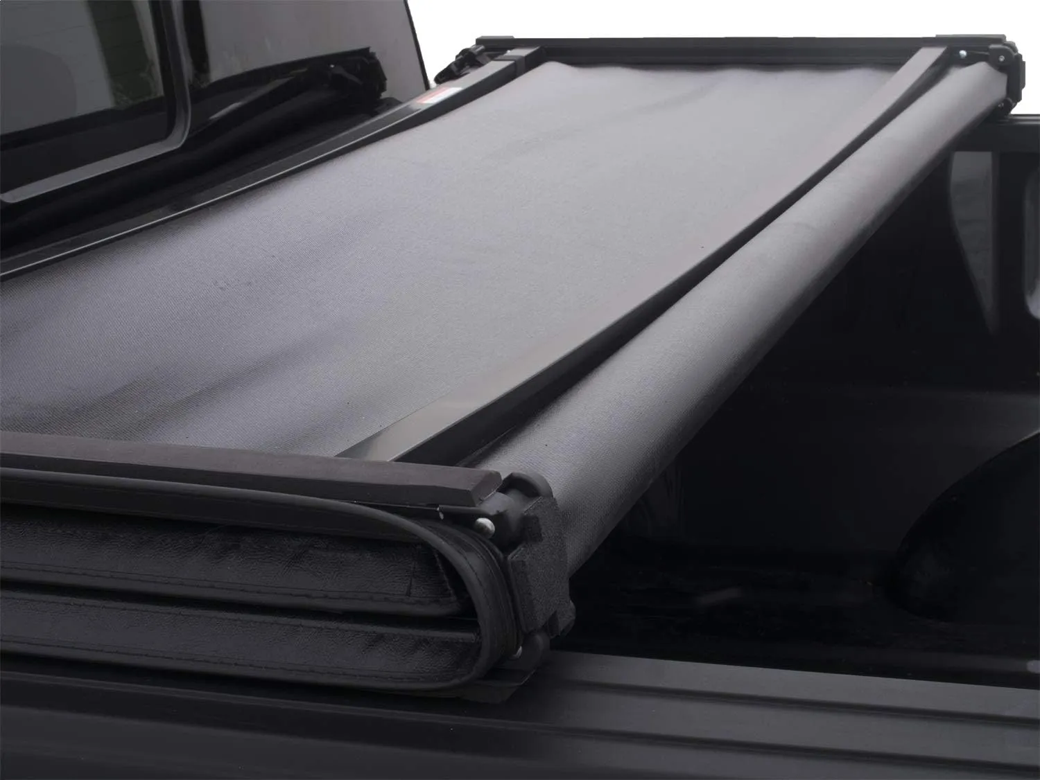 Lund Genesis Tri-Fold Soft Folding Truck Bed Tonneau Cover | 95072 | Fits 2009 - 2014 Ford F-150 5' 7" Bed (67")